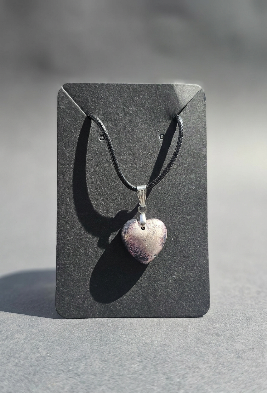 Velvet Alchemy: Violet Eclipse Heart Pendant